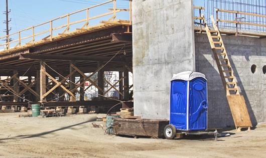 multiple porta potties arranged for easy access at a job site